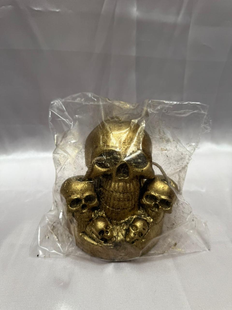 Velón Cráneo Dorado con Calaveras